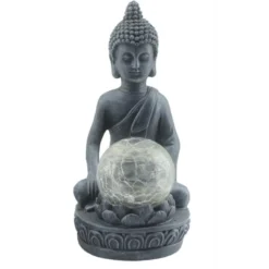 Statue bouddha assis solaire